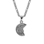 A silver colored Christopher stainless steel pendant in the shape of a half moon with intricate details and a figaro chain.