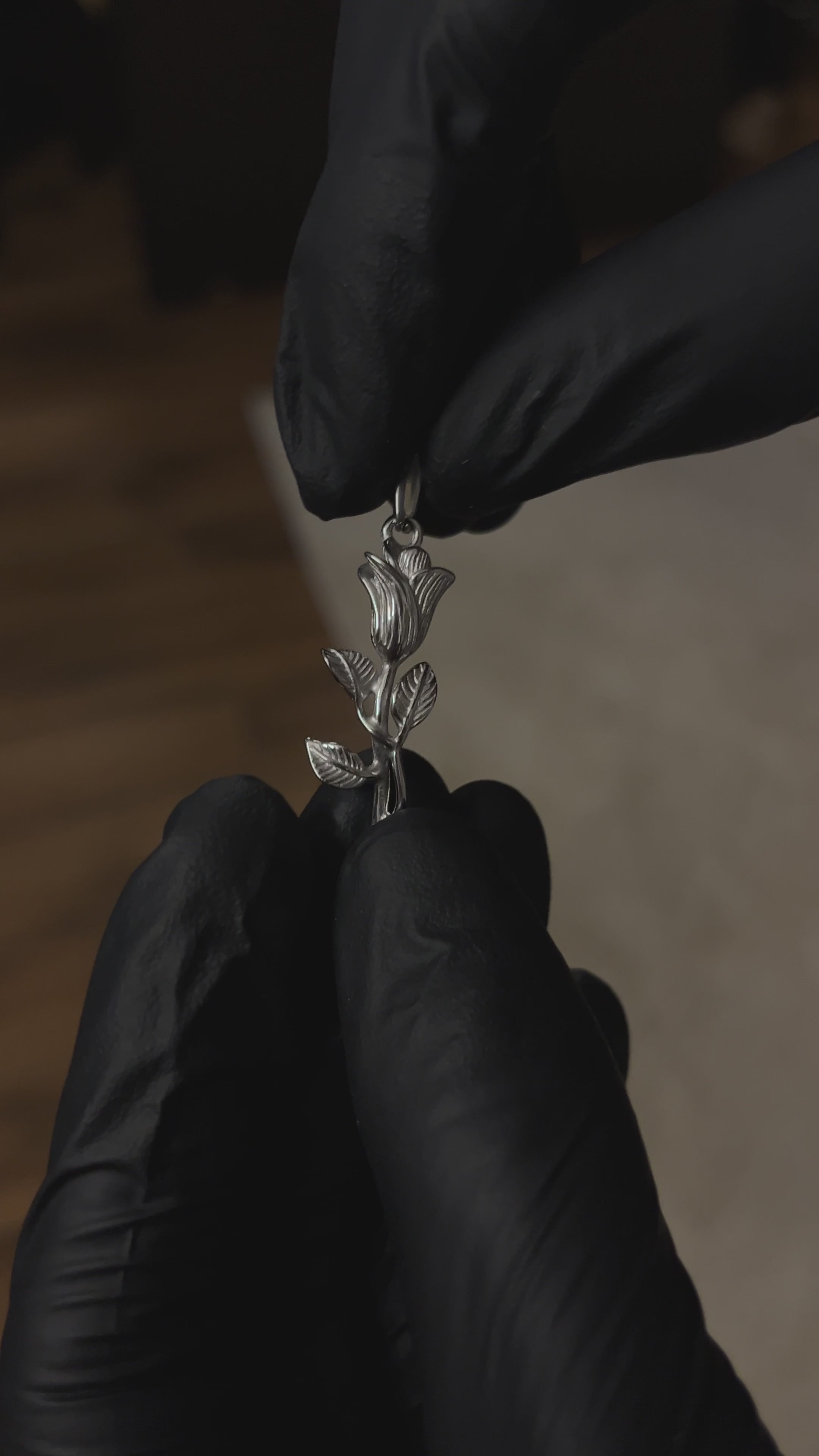 Presenting the Silver Rose Pendant, crafted with a unique and delicate design featuring finely shaped leaves, made as a unisex jewelry piece suitable for everyday wear by both men and women
