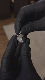 Highlighting the Christopher Pendant with its refined curves and detailed craftsmanship, while the close-up view captures its realistic texture and appearance as it looks in real life.